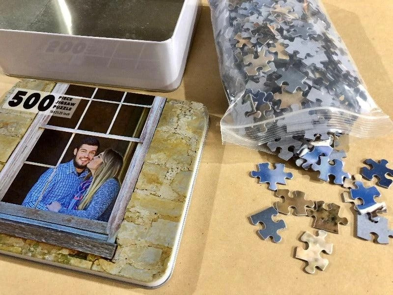 Custom 500 piece photo puzzle of a couple with keepsake metal tin and puzzle pieces